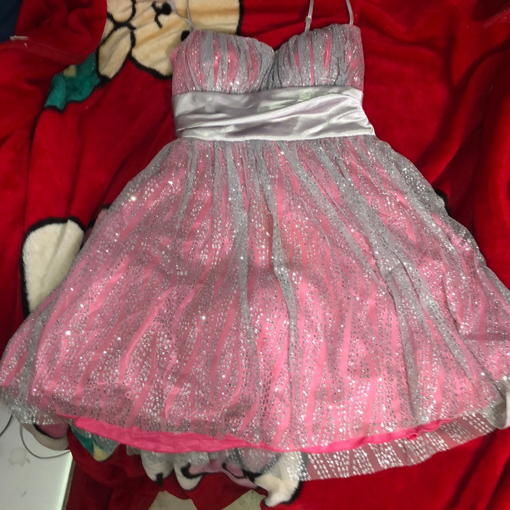 Pink dress with silver sparkles on top